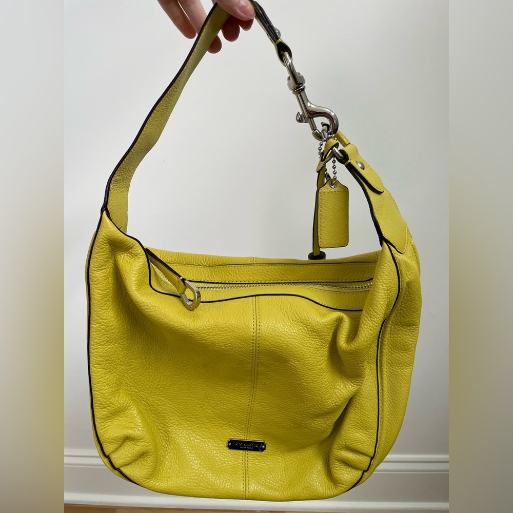 Beautiful leather Coach purse yellow/green color